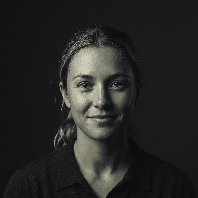 Cleo, the calm AI call handler, shown as her marketing portrait before she begins operating